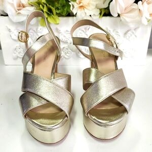 Stuart Weitzman crisscross gold champagne metallic sandals size 5.5